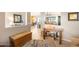 Spacious entryway featuring wood accents, neutral walls, tile flooring, and a view into the living space at 16384 W Salado Creek Dr, Surprise, AZ 85387