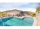 Sparkling pool area with lounge chairs and a patio, perfect for enjoying sunny days at 16384 W Salado Creek Dr, Surprise, AZ 85387