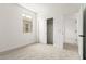 Bedroom featuring a window and closet with sliding doors at 17043 W Fetlock Trl, Surprise, AZ 85387