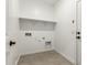 Laundry room with a shelf at 17043 W Fetlock Trl, Surprise, AZ 85387