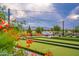 Outdoor bocce ball court featuring string lights and mountain views offers an inviting community recreational space at 17244 W West Wind Dr, Surprise, AZ 85387