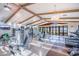 Well-equipped gym with modern exercise machines and a view of the lake at 17244 W West Wind Dr, Surprise, AZ 85387