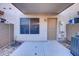 Back porch with stone landscaping and a door leading to the house at 1961 N Hartford St # 1149, Chandler, AZ 85225