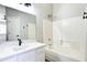 Bright bathroom featuring a shower-tub combo, single vanity, and tile flooring at 1961 N Hartford St # 1149, Chandler, AZ 85225