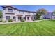 Inviting townhouse featuring a well-maintained lawn and charming architecture, perfect for comfortable living at 1961 N Hartford St # 1149, Chandler, AZ 85225
