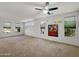 Bright and spacious bedroom with large windows and neutral carpet at 19982 N Tealstone Dr, Surprise, AZ 85374