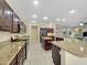 Spacious kitchen with granite counters, stainless appliances, and dual islands at 19982 N Tealstone Dr, Surprise, AZ 85374