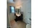 Well-organized bathroom featuring tiled flooring and a vanity at 22074 S 211Th St, Queen Creek, AZ 85142