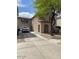 Two-story home with desert landscaping, cement driveway and arched front entry at 22074 S 211Th St, Queen Creek, AZ 85142