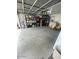 Organized garage with shelving for storage and ample space for parking at 22074 S 211Th St, Queen Creek, AZ 85142