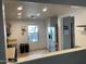 Open kitchen with stainless steel refrigerator and a view of the backyard at 22074 S 211Th St, Queen Creek, AZ 85142