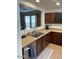Kitchen view showcasing the countertop, sink, and cabinets at 22074 S 211Th St, Queen Creek, AZ 85142