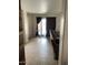 The living room features tile flooring and a sliding glass door at 22074 S 211Th St, Queen Creek, AZ 85142