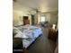 Spacious main bedroom offers calm ambiance with modern finishes, ample natural light, and a comfortable layout at 22074 S 211Th St, Queen Creek, AZ 85142