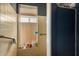 Bright bathroom shower with tiled walls and a window for natural light at 2324 E Cortez St, Phoenix, AZ 85028