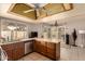 Updated kitchen showcasing stainless steel appliances, a breakfast bar, and easy access to both indoor and outdoor living areas at 2324 E Cortez St, Phoenix, AZ 85028