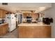 Functional kitchen featuring an island, stainless steel appliances, and plenty of counter space for cooking at 2324 E Cortez St, Phoenix, AZ 85028