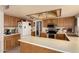 Spacious kitchen with an island, stainless steel appliances, and ample counter space for meal preparation at 2324 E Cortez St, Phoenix, AZ 85028