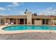 Refreshing backyard pool with ample patio space, ideal for outdoor gatherings and enjoying sunny days in style at 2324 E Cortez St, Phoenix, AZ 85028