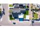 Crisp aerial shot showcases modern home design with a dark roof and minimalist landscaping at 2546 E Roma Ave, Phoenix, AZ 85016