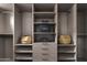 Spacious closet with custom shelving, drawers, and ample storage space for organization at 2546 E Roma Ave, Phoenix, AZ 85016