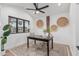 Cozy office featuring stylish decor, a patterned rug, natural light, and a peaceful work environment at 2546 E Roma Ave, Phoenix, AZ 85016