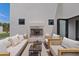 Stylish outdoor patio featuring a modern fireplace, comfortable seating, and a sleek design at 2546 E Roma Ave, Phoenix, AZ 85016