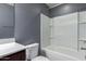 This bathroom features a modern vanity, toilet, and a shower-tub combo, designed for functionality and convenience at 25627 N 163Rd Dr, Surprise, AZ 85387
