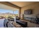 Enjoy the open air living space with views of the water feature and mountains beyond at 26689 W Ponderosa Ln, Buckeye, AZ 85396