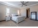 Cozy bedroom with a large bed, side tables, and plenty of space at 26689 W Ponderosa Ln, Buckeye, AZ 85396