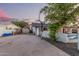 Large backyard with shed, sport court, wood storage, and access to the pool area at 2726 E Hale St, Mesa, AZ 85213
