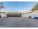 Spacious backyard with concrete area for storage, parking, or play, surrounded by block wall fencing at 2726 E Hale St, Mesa, AZ 85213