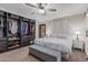 Spacious main bedroom features a large walk-in closet and a ceiling fan for comfort at 2726 E Hale St, Mesa, AZ 85213