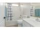 Well-lit bathroom featuring a shower-tub combo and a white vanity at 29193 N Mountain View Rd, San Tan Valley, AZ 85143