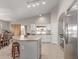 Open concept kitchen features stainless steel appliances, and a granite counter top island with seating at 29193 N Mountain View Rd, San Tan Valley, AZ 85143