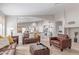 Bright, inviting living room with open concept to the kitchen, perfect for entertaining guests at 29193 N Mountain View Rd, San Tan Valley, AZ 85143