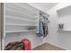 Spacious walk-in closet featuring built in shelving and hanging rods, offering ample storage at 29193 N Mountain View Rd, San Tan Valley, AZ 85143
