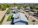 Stunning aerial view of this home showcasing the pool, yard, and neighborhood at 3138 N 82Nd Pl, Scottsdale, AZ 85251