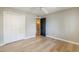 Bedroom featuring wood floors, a closet and a view of another room at 3138 N 82Nd Pl, Scottsdale, AZ 85251