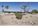 Inviting single-story residence with low-maintenance desert landscaping, river rock borders, and a two-car garage at 3138 N 82Nd Pl, Scottsdale, AZ 85251