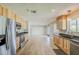 Kitchen boasts modern appliances, granite counters, and bright cabinets at 3138 N 82Nd Pl, Scottsdale, AZ 85251