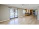 Inviting living space boasts hardwood floors, modern fixtures, natural light, and a connecting kitchen area at 3138 N 82Nd Pl, Scottsdale, AZ 85251