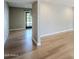 Bright living room with gorgeous hardwood floors, neutral paint, recessed lighting, and access to an outdoor space at 3138 N 82Nd Pl, Scottsdale, AZ 85251