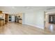 Bright living room showcasing an open layout, ceiling fan, and front door at 3138 N 82Nd Pl, Scottsdale, AZ 85251