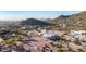 Expansive desert home featuring a circular driveway, and mature desert landscaping at 3333 N 87Th St, Mesa, AZ 85207