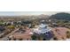 Expansive desert home featuring a circular driveway, and mature desert landscaping at 3333 N 87Th St, Mesa, AZ 85207