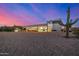 Back exterior featuring ample space with drought landscaping, covered patios, scenic views and recreational vehicle parking at 3333 N 87Th St, Mesa, AZ 85207
