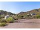 Spacious desert property featuring neutral stucco, natural landscaping, and a desert terrain at 3333 N 87Th St, Mesa, AZ 85207