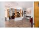 Bright foyer with an archway leading to a carpeted room and a glimpse of the staircase at 3333 N 87Th St, Mesa, AZ 85207
