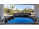 Inviting hot tub area surrounded by desert landscaping and beautiful outdoor views at 3333 N 87Th St, Mesa, AZ 85207